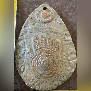 Hand made wall hanging ceramic Hamsa.